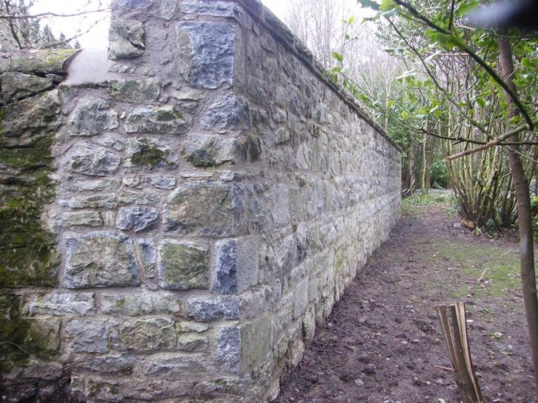 Repair and upgrade sections of stone wall at Coole/Garryland Nature Reserve